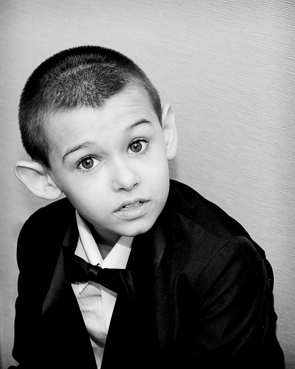 portrait of a child in their tuxedo